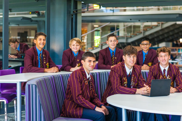 Holy Cross College Ryde students sitting in a class school